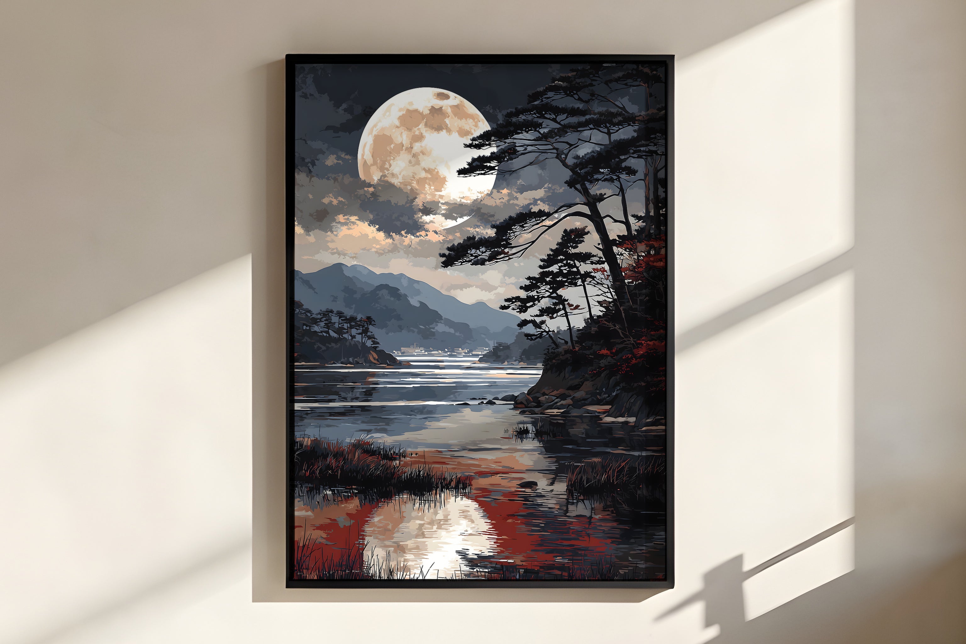 Close-up of Indigo Moon Inlet showing moon reflection corridor on still water and crimson foliage on rocky shoreline