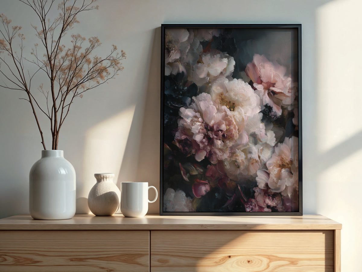 Close-up of Blush Peony Nocturne showing large ivory peony blooms with soft blush gradients emerging from a deep dark ground